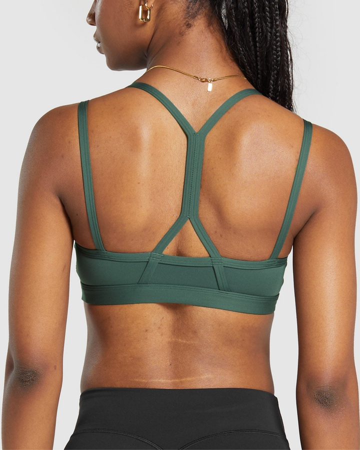 Ava strap Feature Sports Bra in Dark Olive